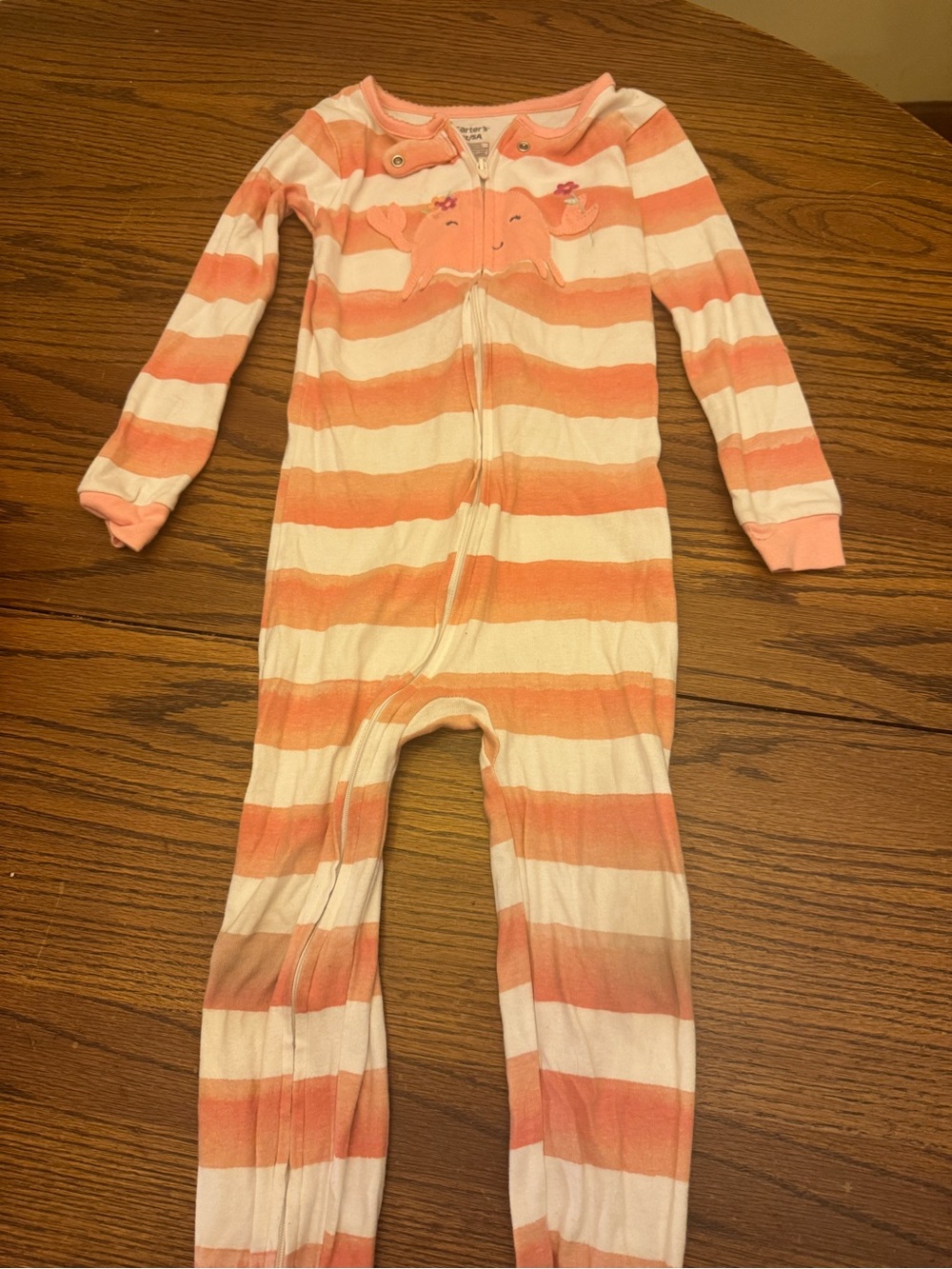 5T Children’s footed pajamas.  4 are by Carter and 1 by Kid’s headquarters.